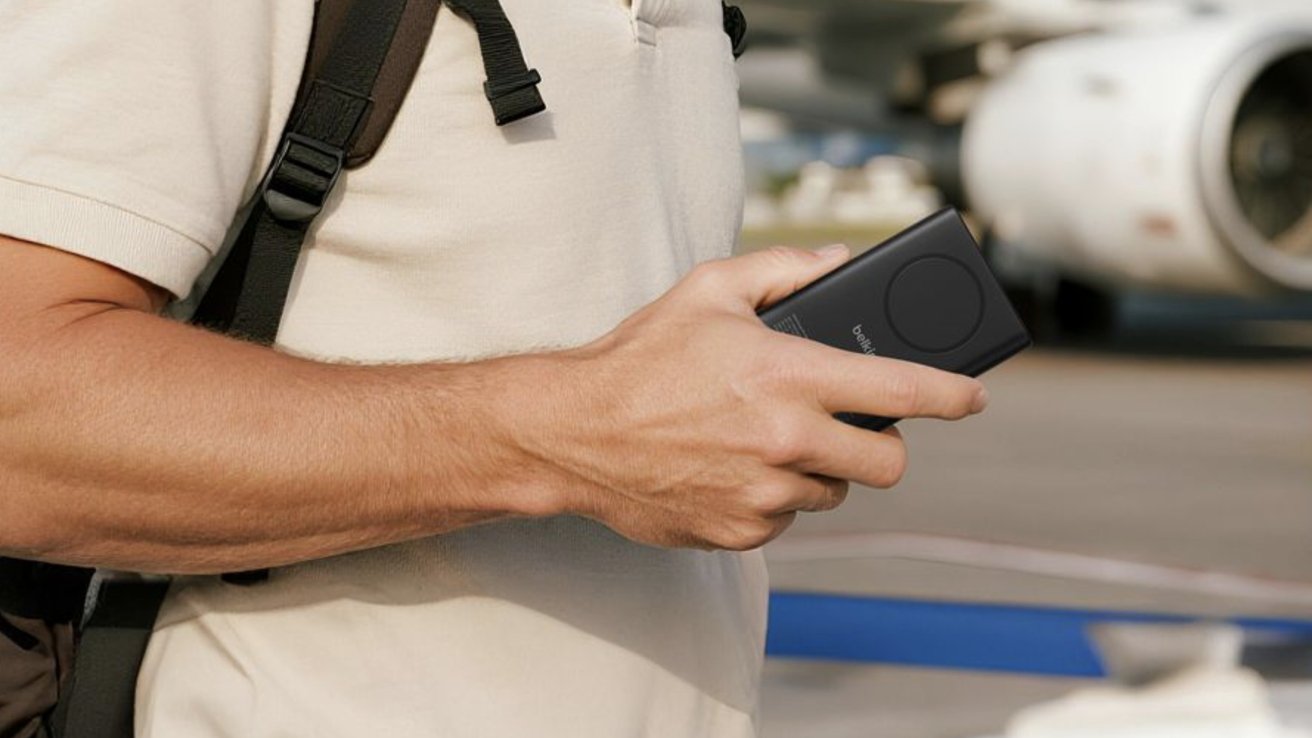 Belkin BoostCharge Pro Qi2 MagSafe battery bank shown with USB-C cable showing pass-through charging