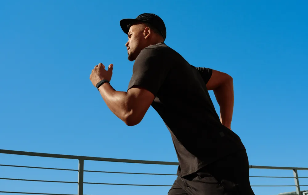 Fitbit Air UK launch obsidian band running outdoors