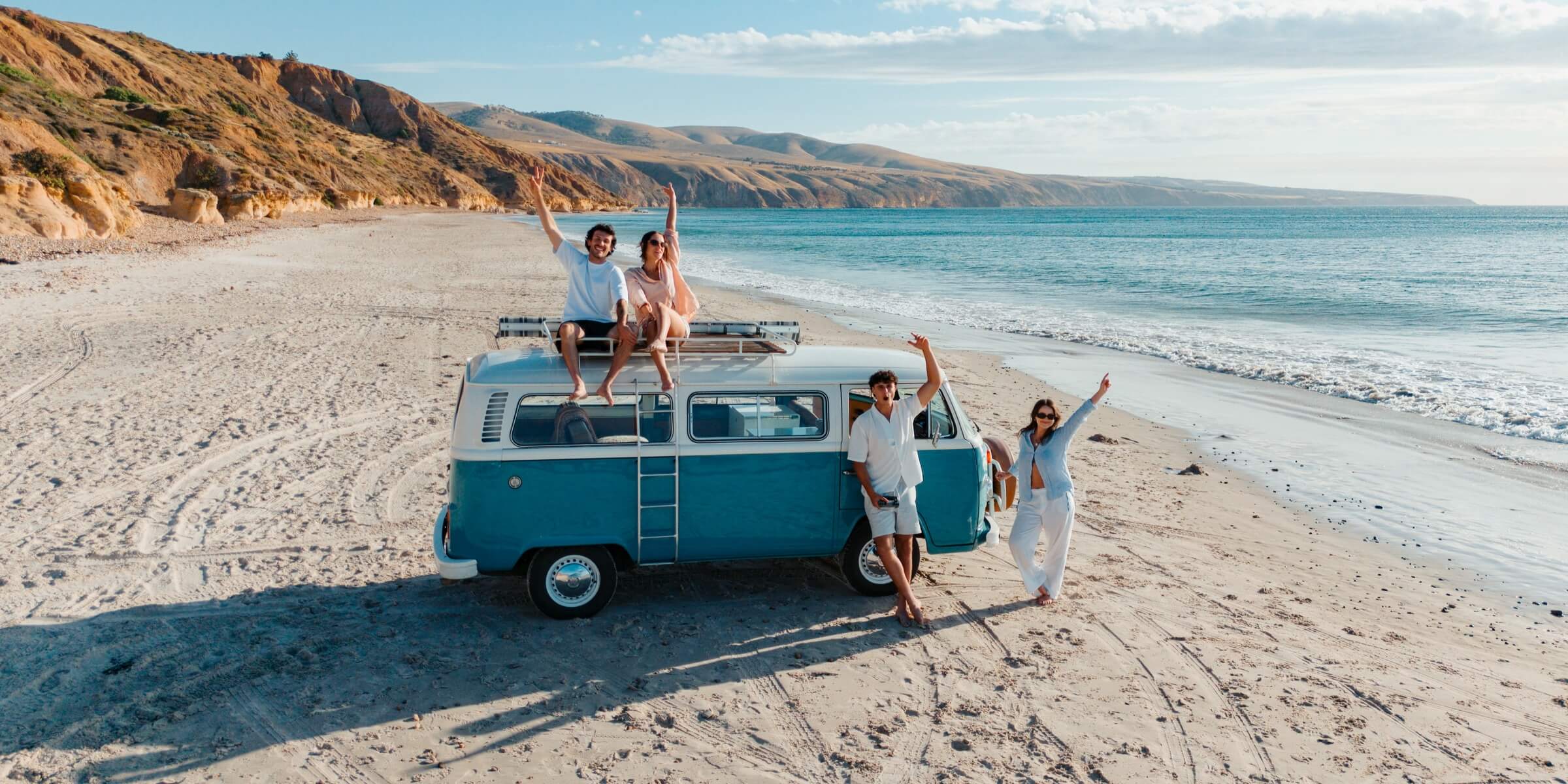 DJI Lito X1 UK travel drone with friends and camper van on a beach