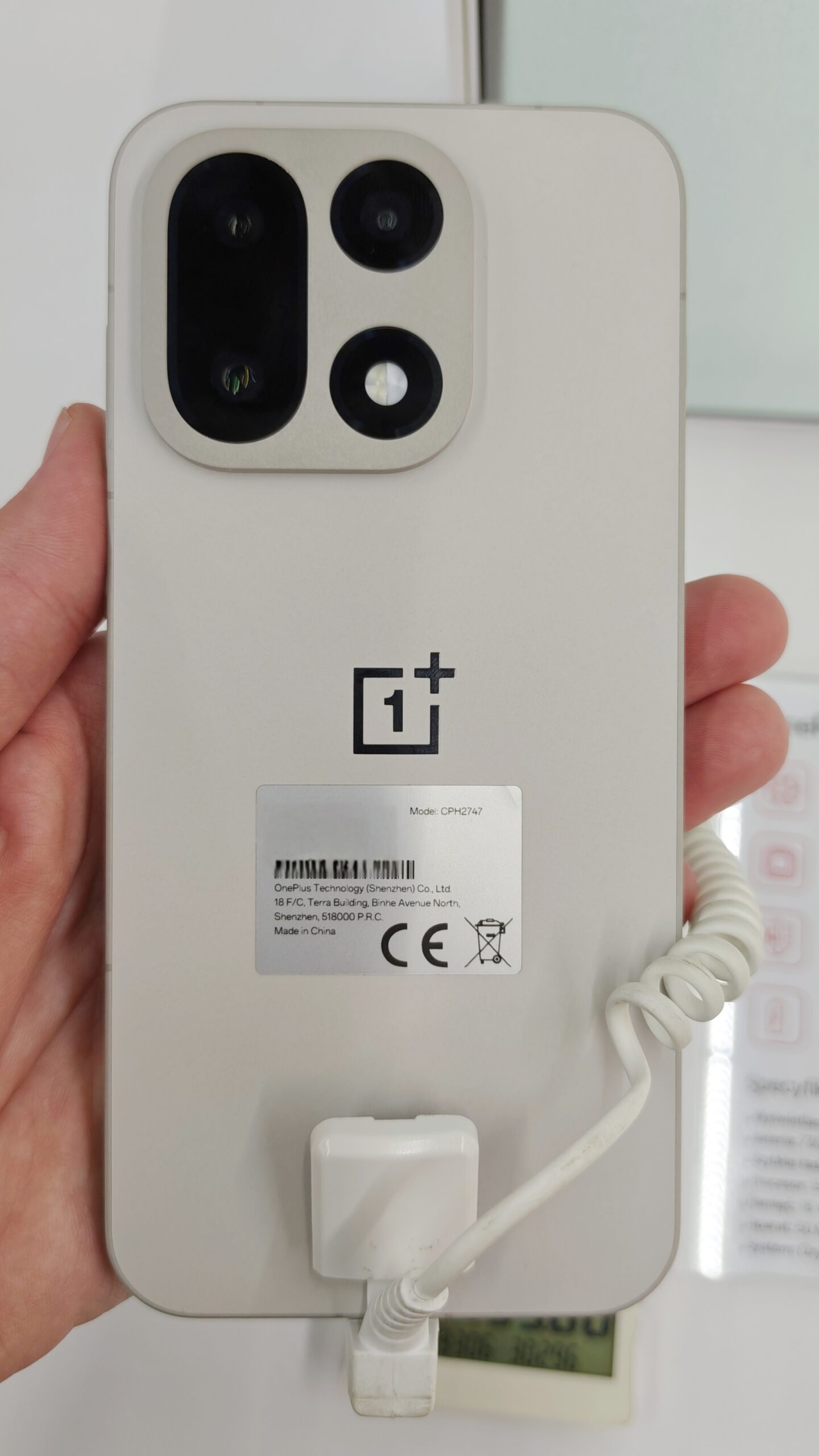 OnePlus 15 rear showing telephoto and main camera lenses