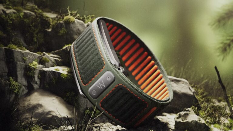 WHOOP Navigator official product image showing the rugged outdoor band on rocks