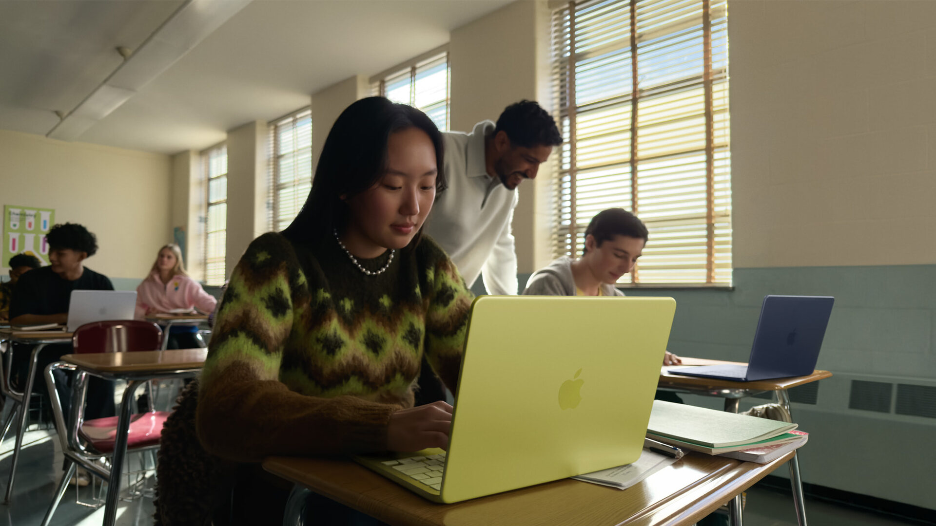 Student using the best laptop under £700, the MacBook Neo, for coursework