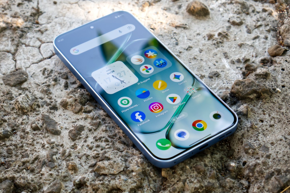 OnePlus Nord CE6 5G phone held in hand outdoors with 1.5K AMOLED display
