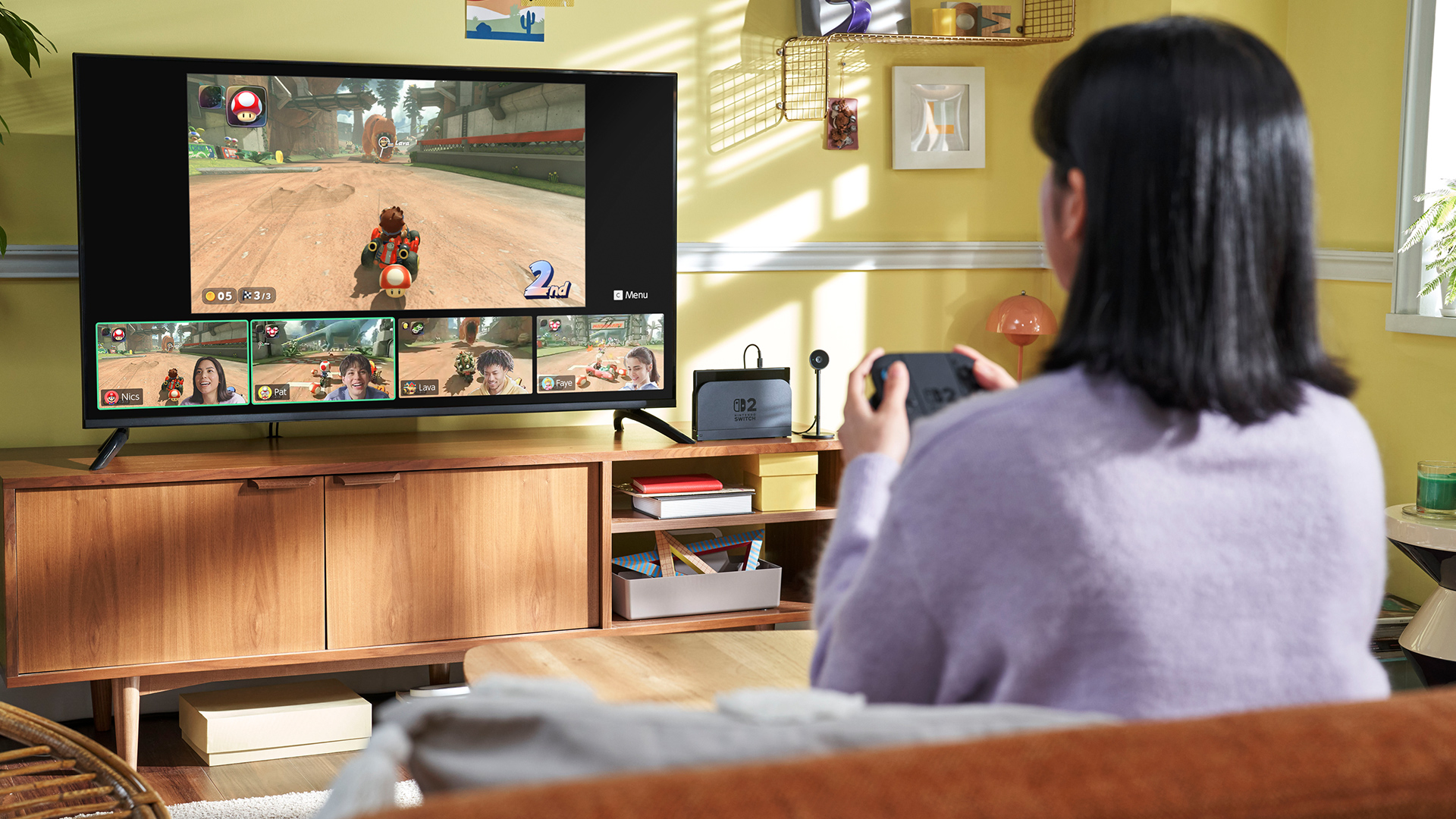 Nintendo Switch 2 accessories supporting four-player multiplayer and GameChat on a TV