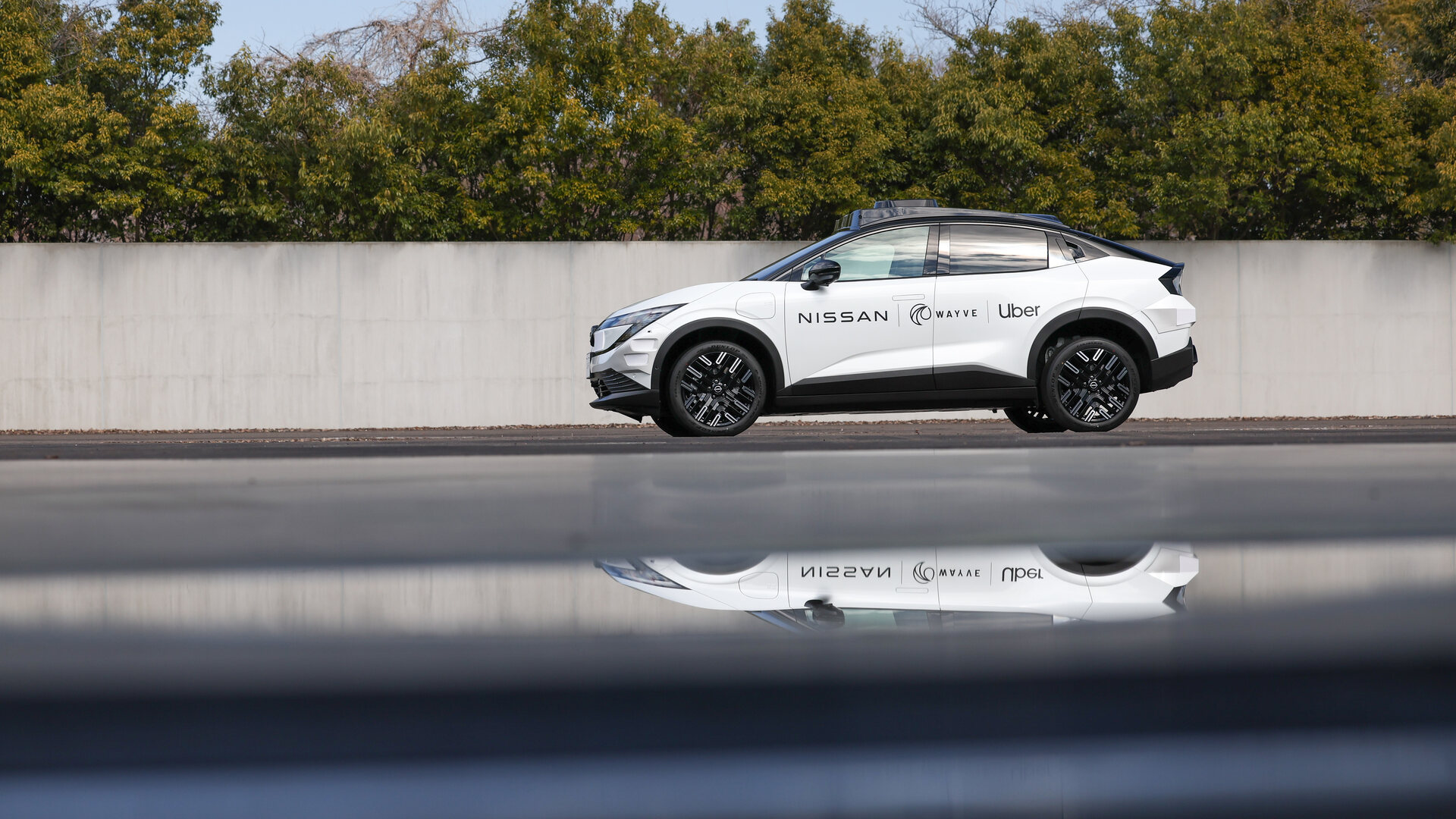 Wayve Stellantis partnership context with Nissan and Uber robotaxi prototype