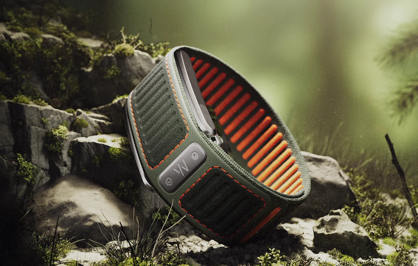 WHOOP Navigator official press image showing the rugged band in an outdoor setting