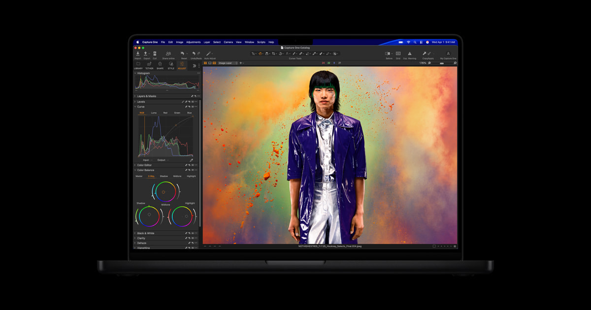 MacBook Pro showing the M5 Pro and M5 Max chips on a dark studio backdrop