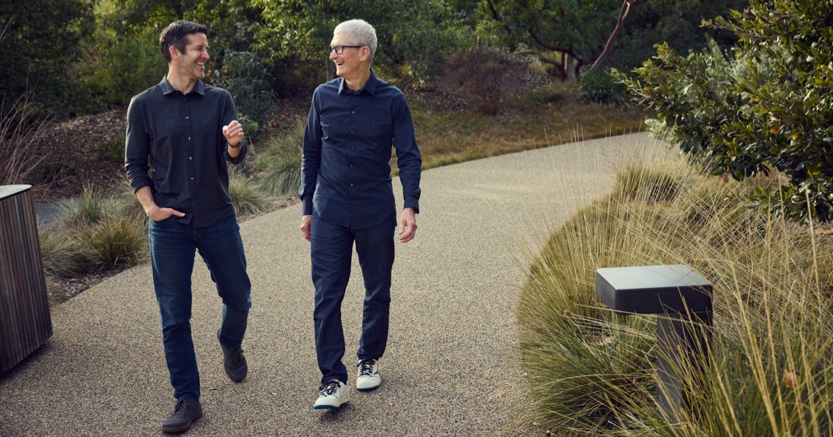 John Ternus, Apple's incoming CEO, walking on stage at an Apple event