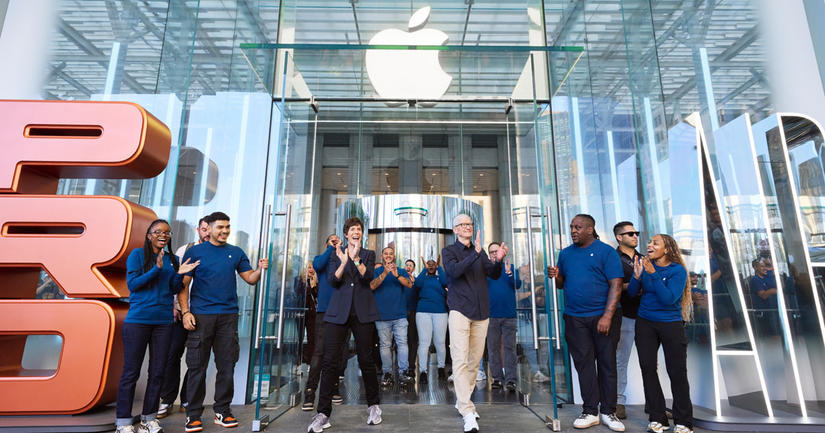 Latest iPhone, Apple Watch and AirPods arranged on a display table inside an Apple Store