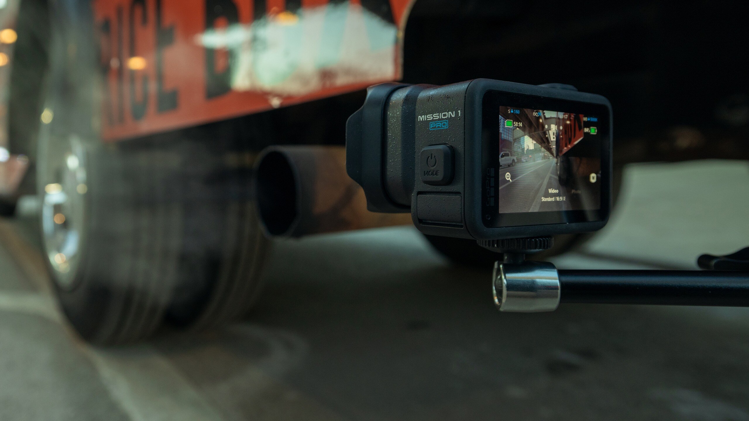 GoPro Mission 1 Pro mounted on a rig for a vehicle shot