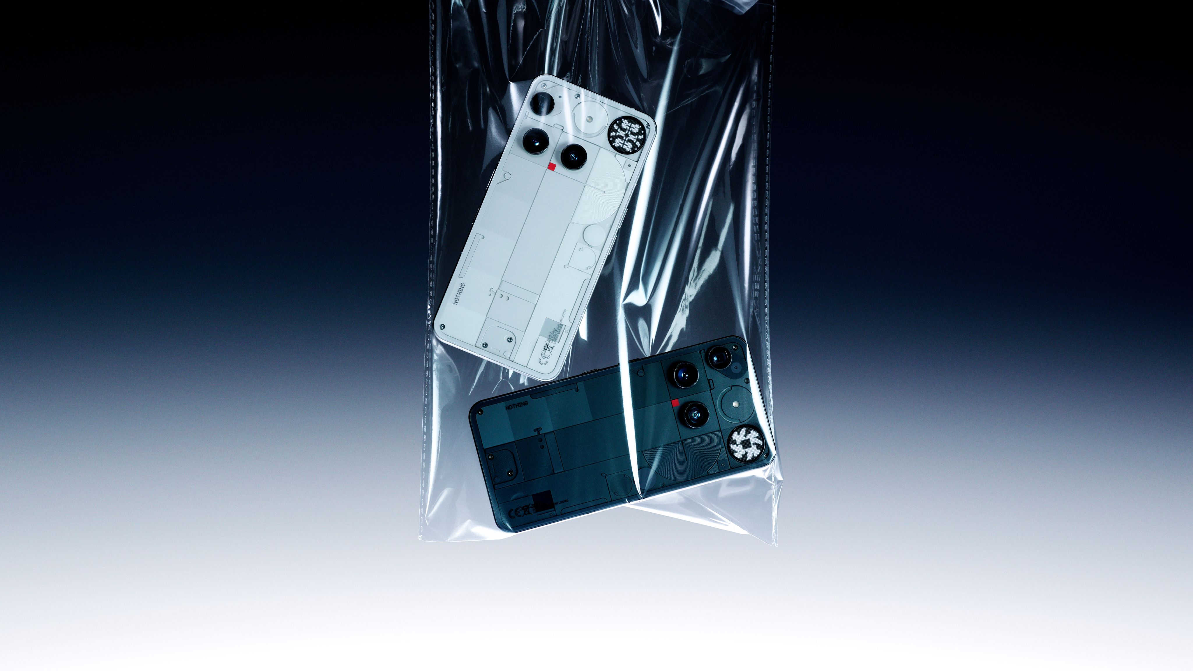 White and black Nothing Phone (3) units shown together