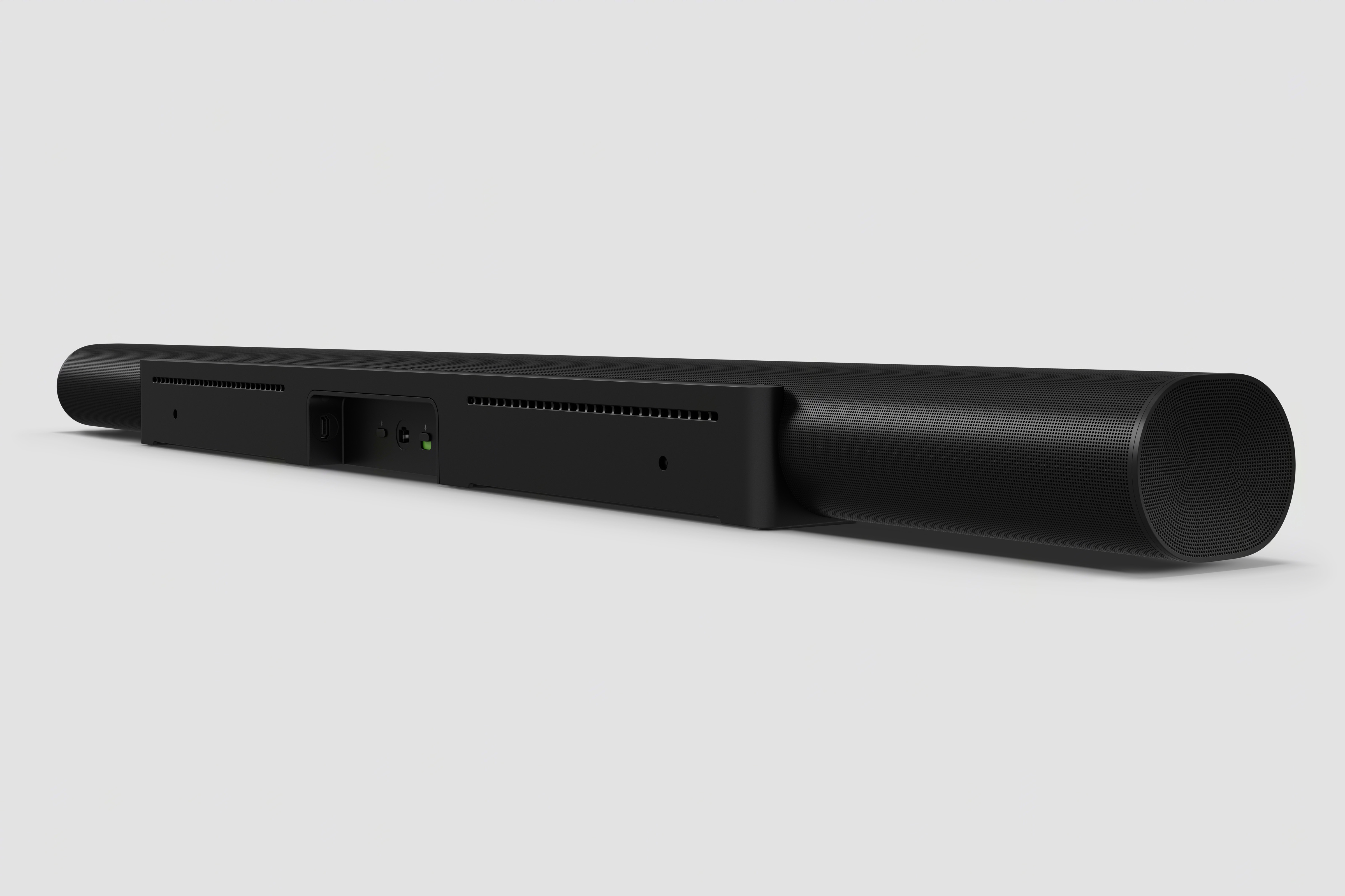 Rear three-quarter view of the Sonos Arc Ultra in black showing the wrap-around grille