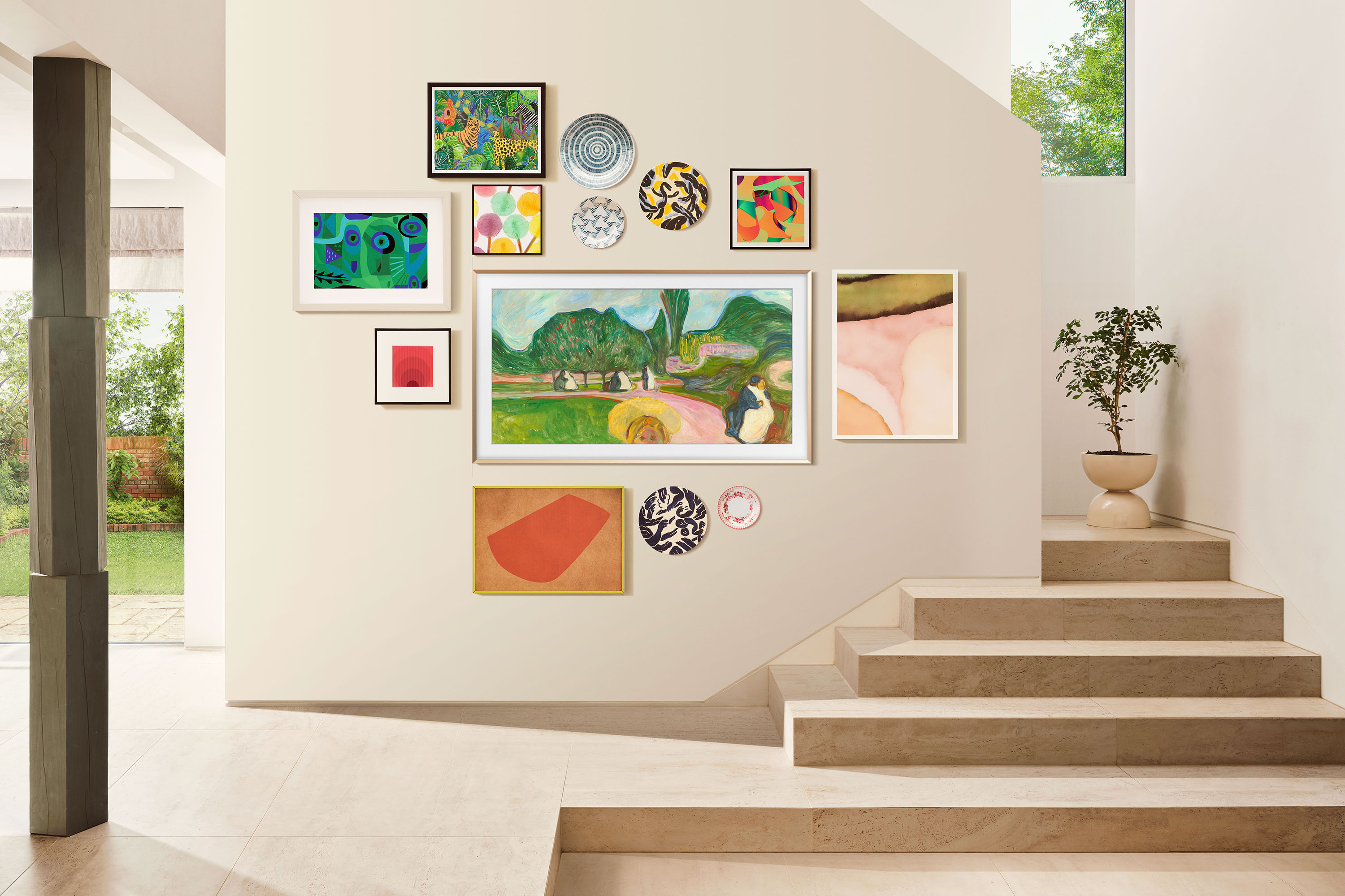 Munch's Kissing Couples in the Park from the Linde Frieze displayed on a wall mounted Samsung Frame TV in a lounge