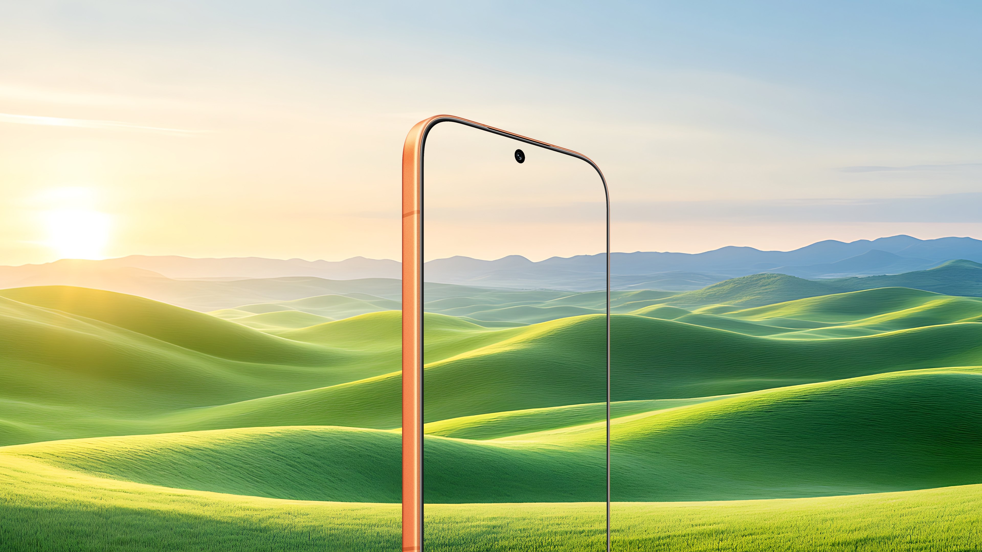 Honor 600 frame against a green rolling hills landscape highlighting the slim build and front camera