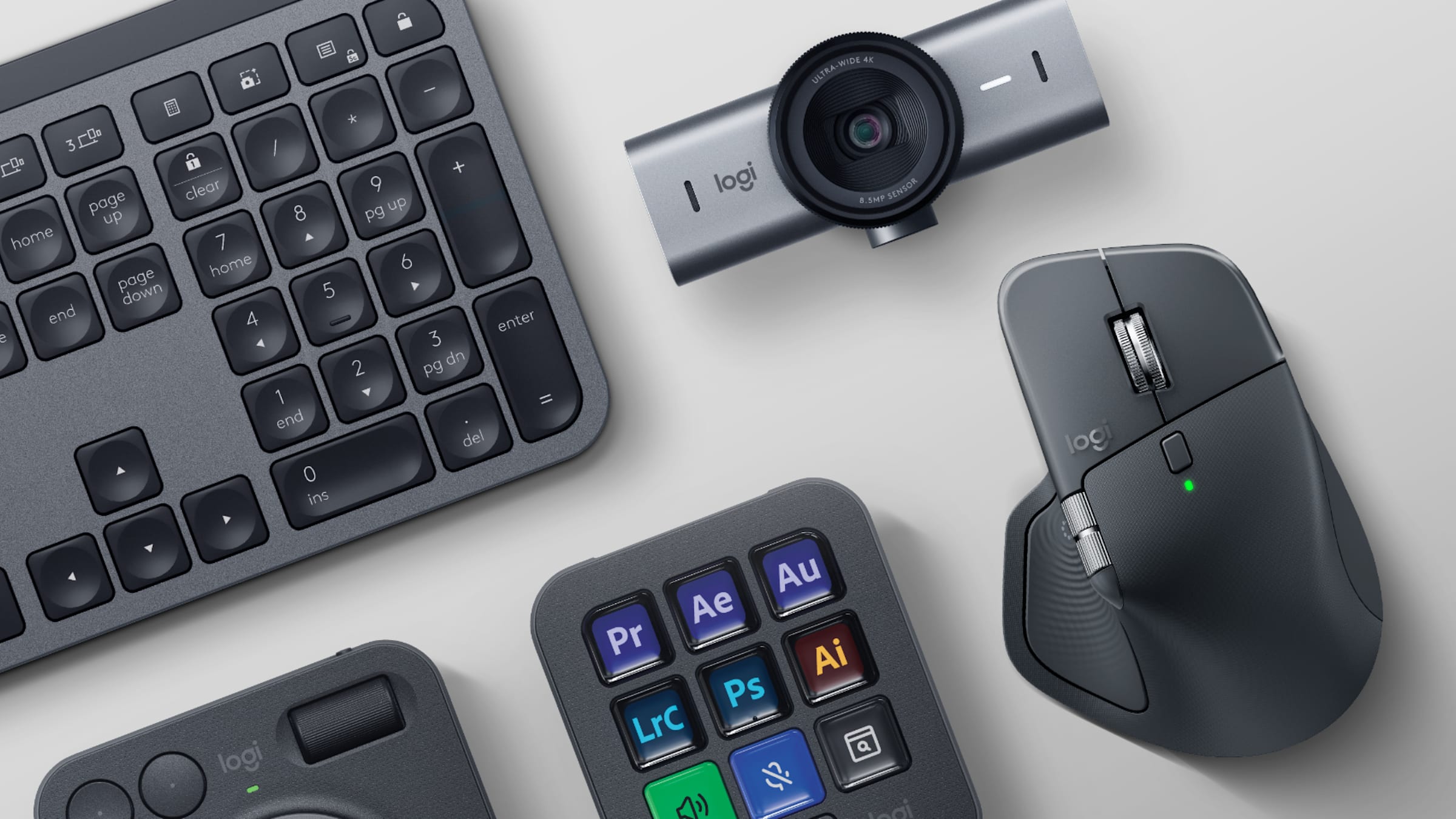 Logitech MX Master 4 alongside a Logitech keyboard, MX Creative Console and 4K webcam on a desk
