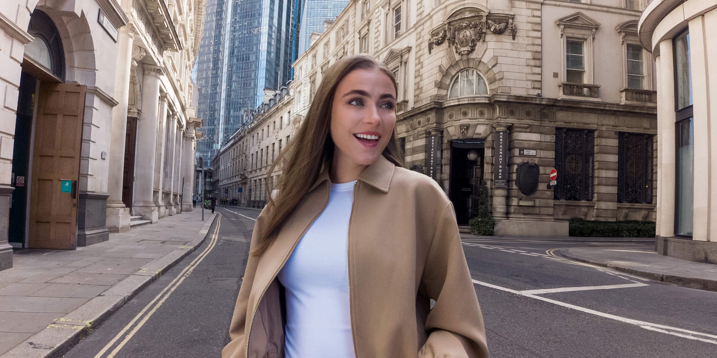 Creator walking a London street, the kind of UK vlogging the DJI Osmo Action 6 suits