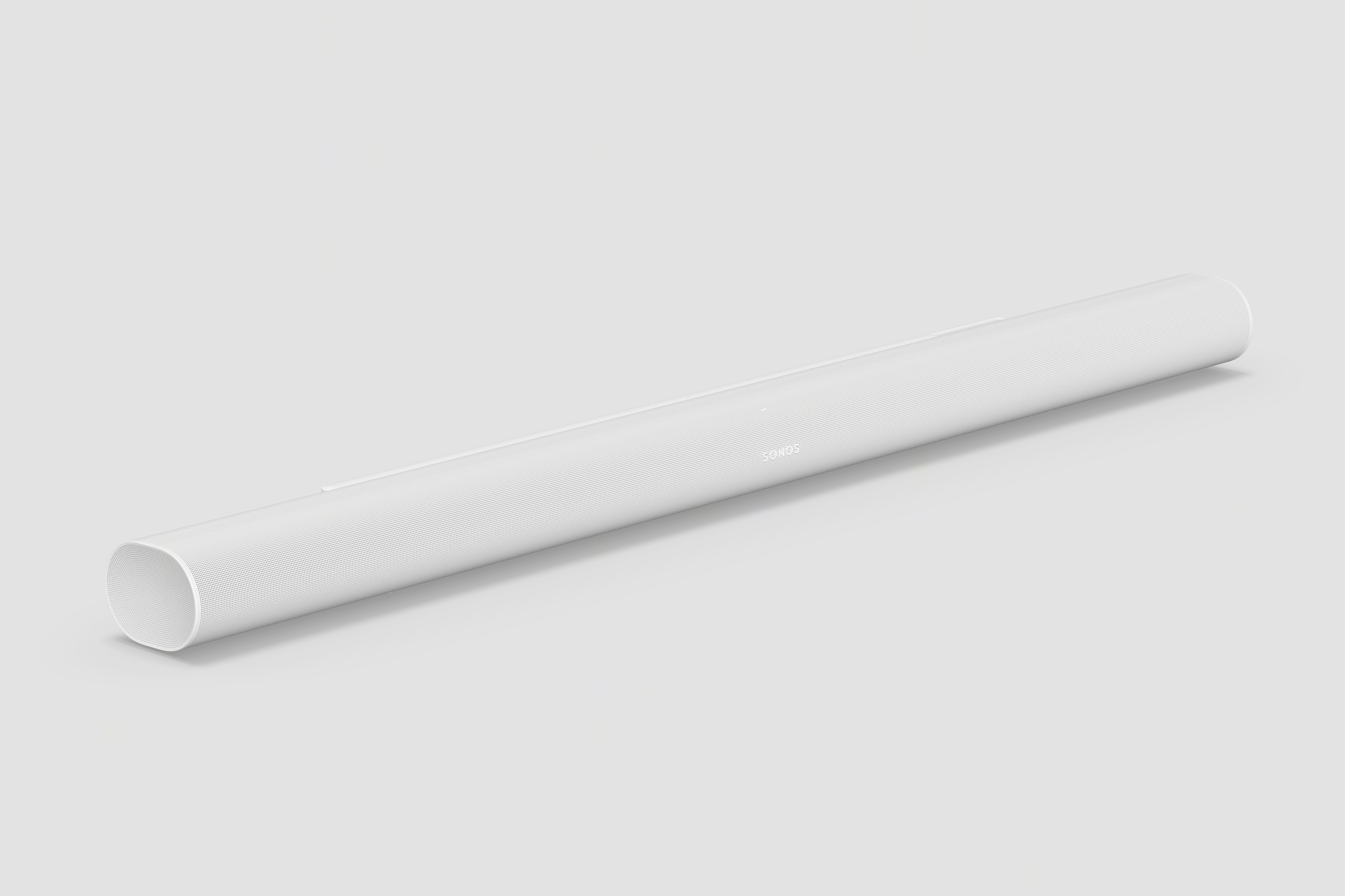 Sonos Arc Ultra in white shown at a three-quarter angle revealing its curved profile