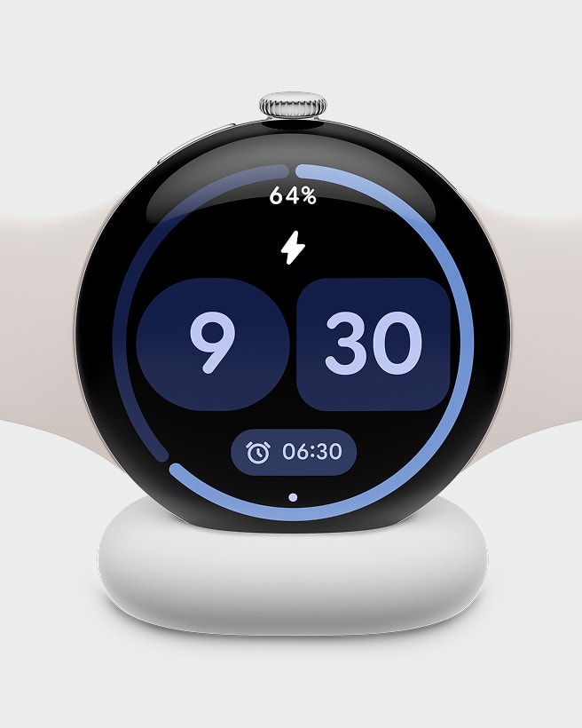 Pixel Watch 4 resting on its magnetic charging puck