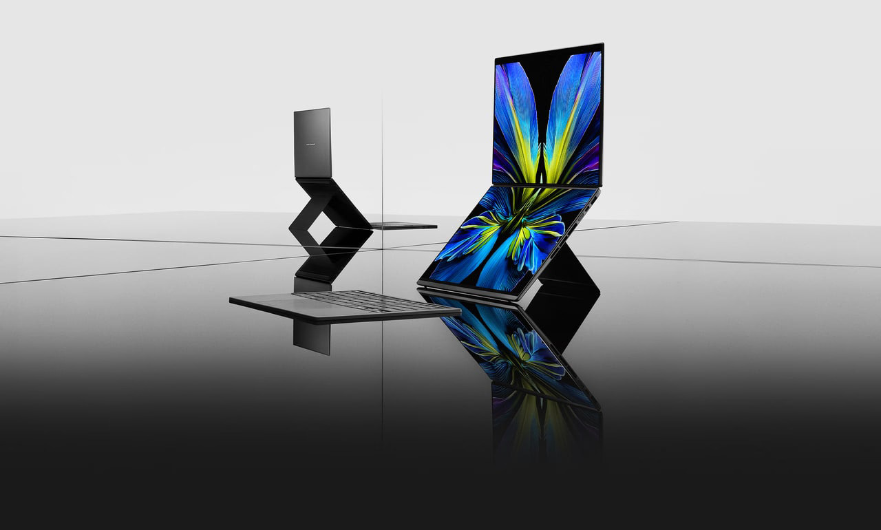 Two ASUS Zenbook DUO 2026 laptops shown with their stacked dual OLED screens