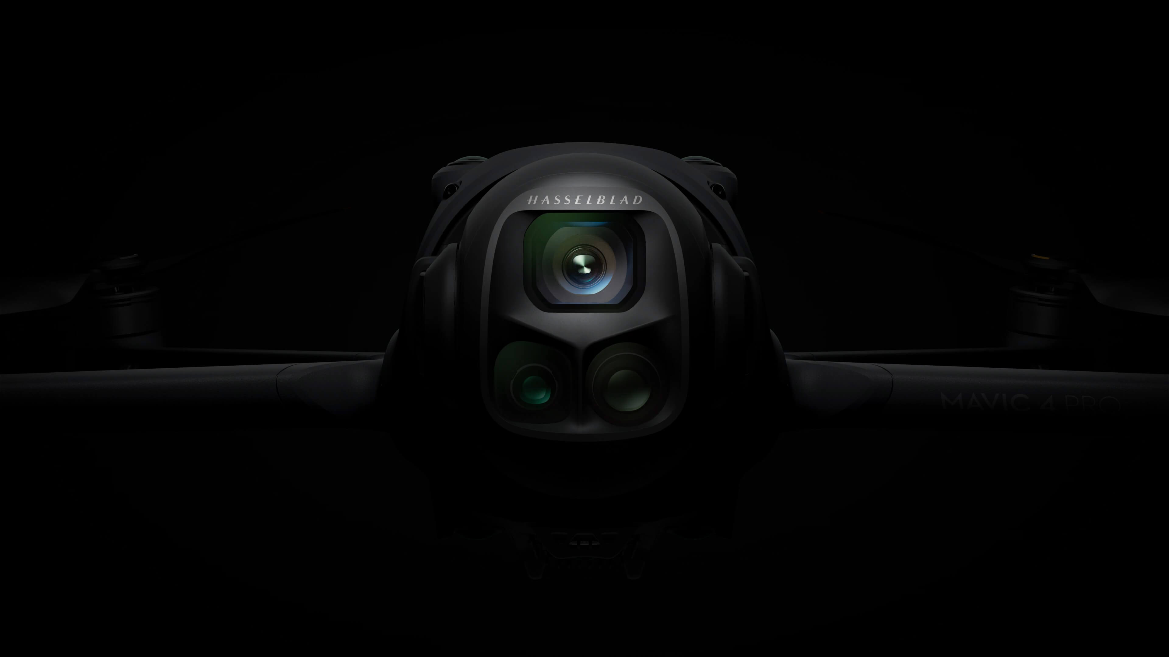 Close-up of the DJI Mavic 4 Pro gimbal showing the Hasselblad main lens and two telephoto lenses