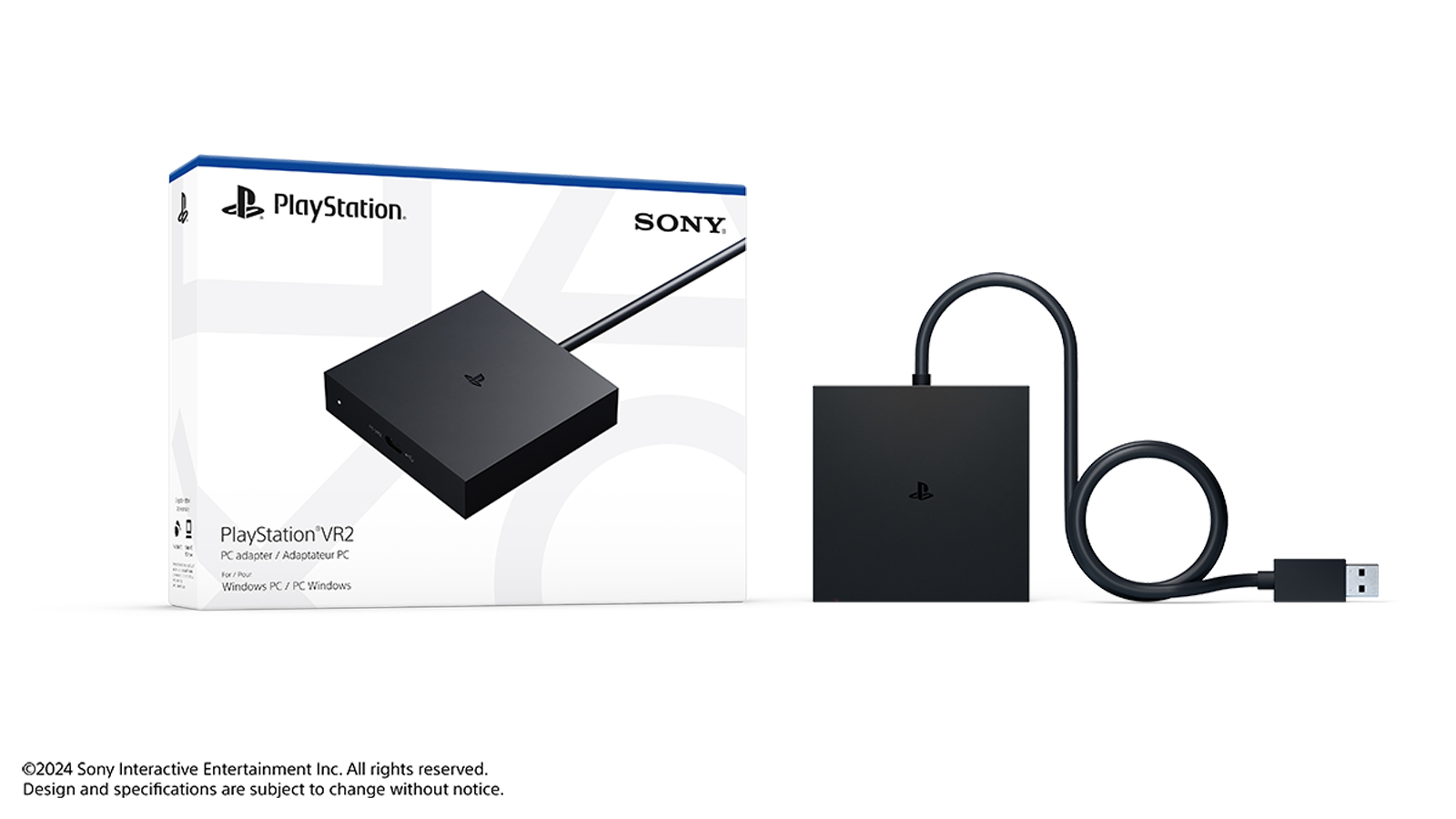 PlayStation VR2 PC adapter retail box next to the black adapter unit with its captive USB cable coiled beside it