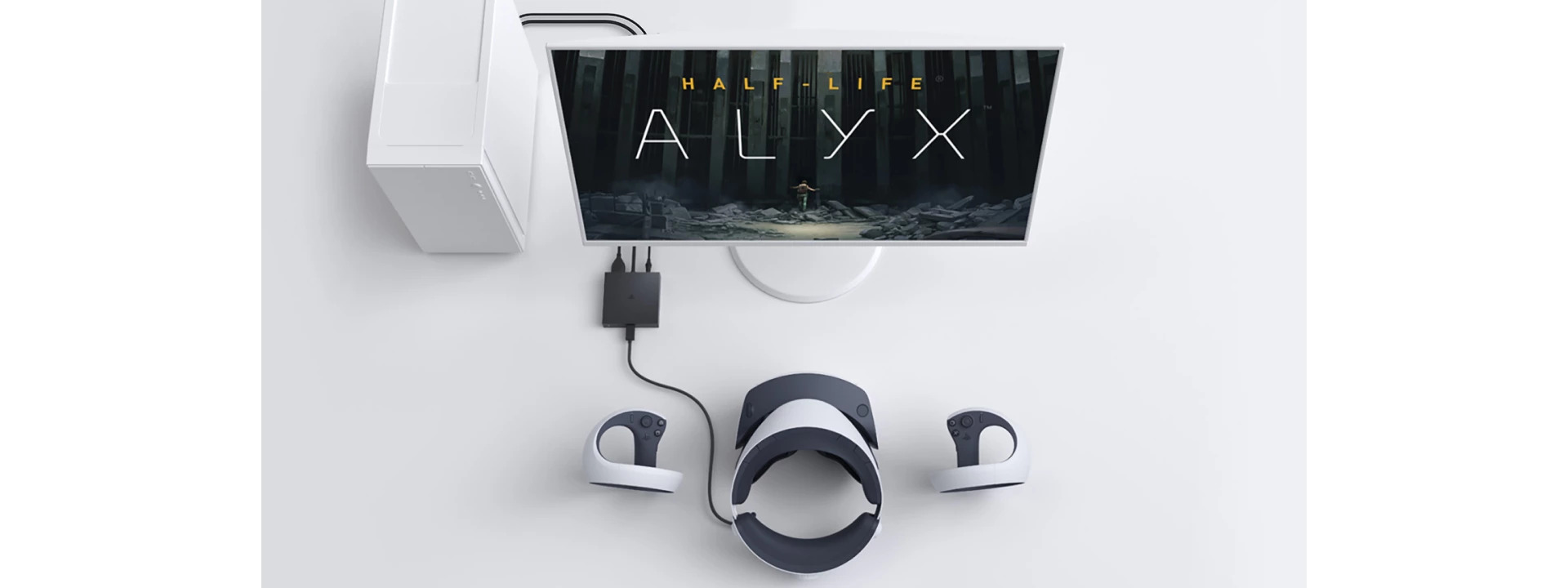 Wide render of a PSVR2 on PC setup with a white tower PC, a monitor running Half-Life: Alyx, the small black PC adapter, and the headset and Sense controllers laid out below