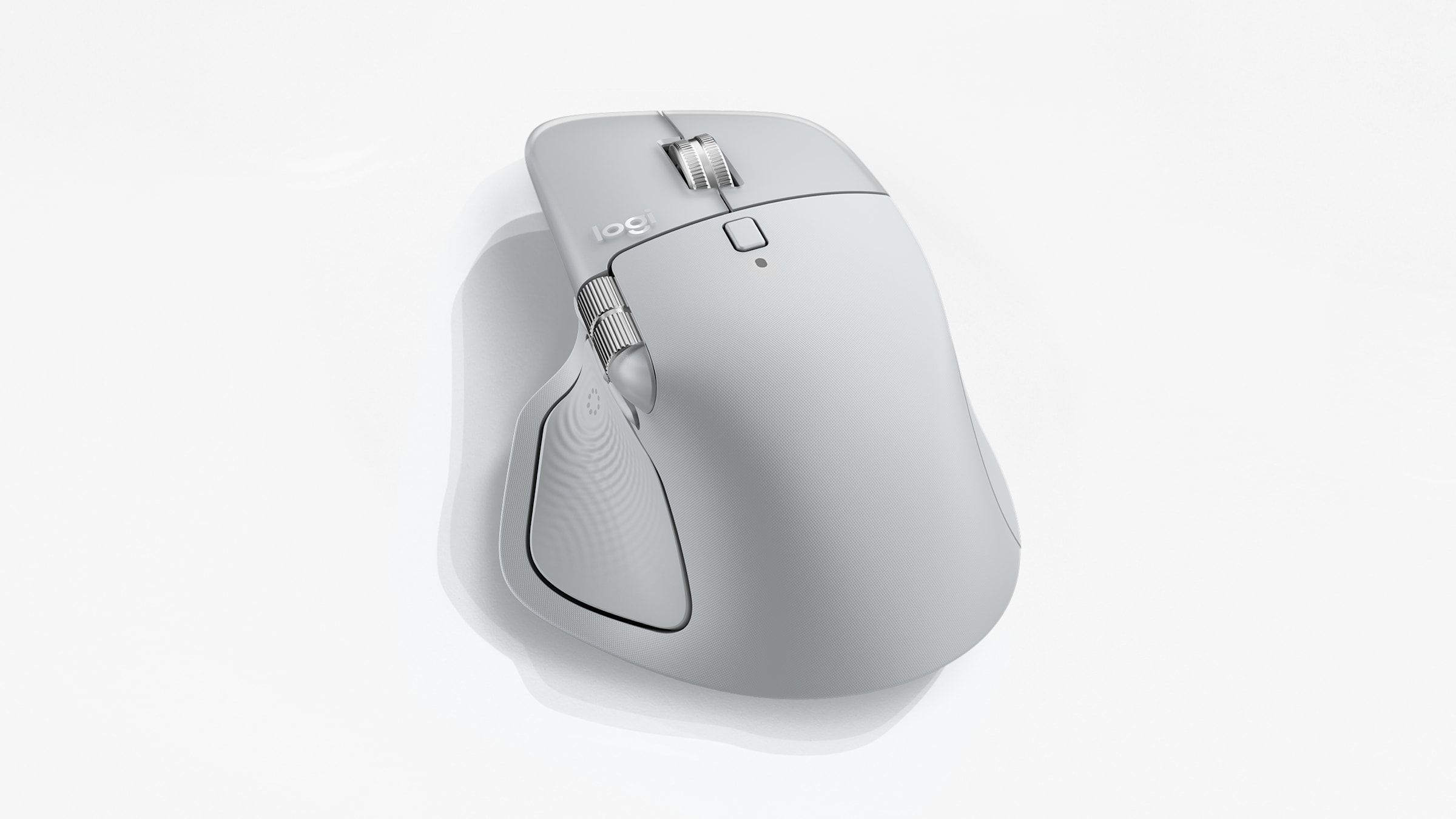 Logitech MX Master 4 in Pale Grey shown top-down on a light background