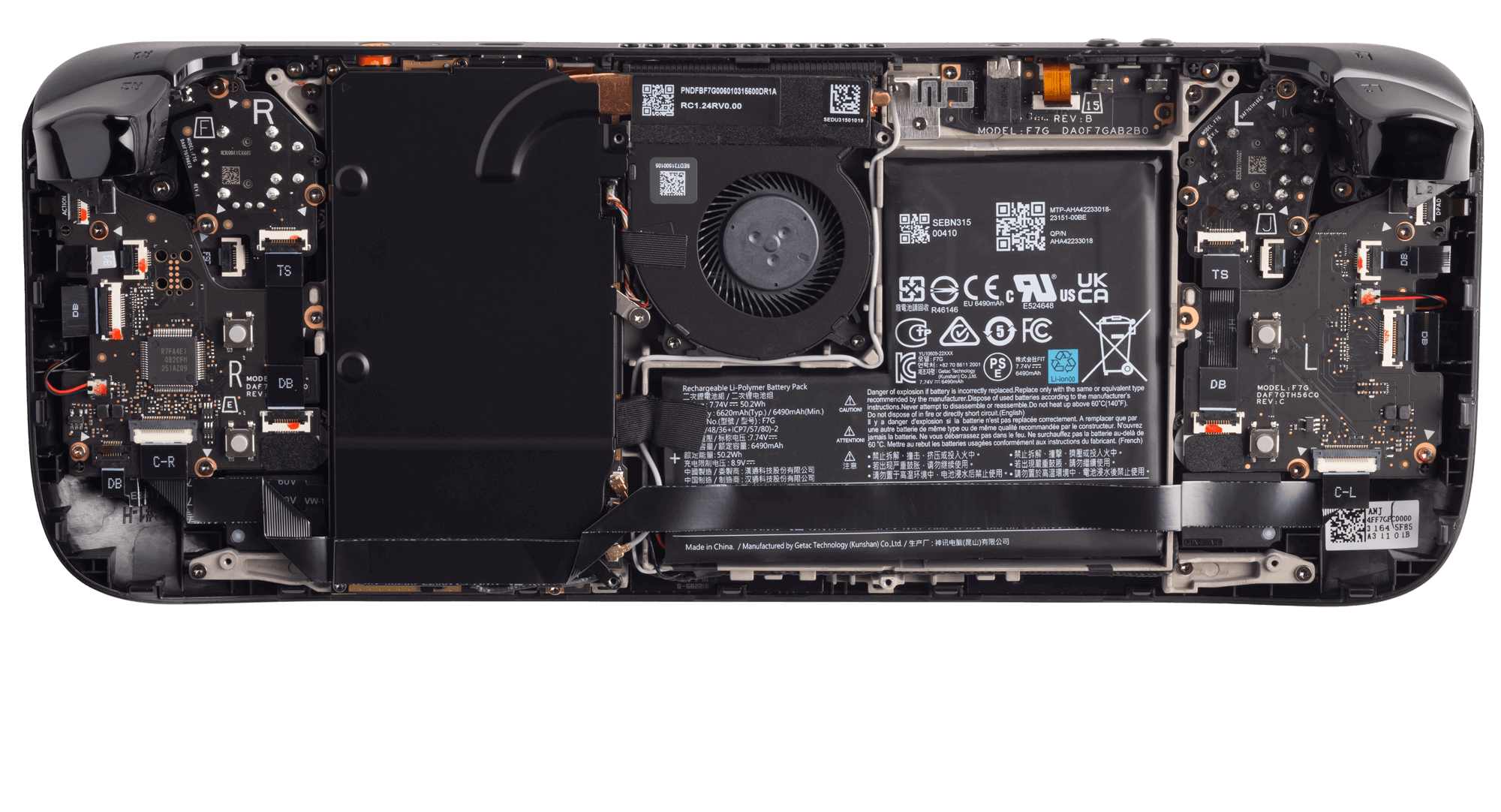 Rear cover removed from a Steam Deck OLED showing the cooling fan, battery and Torx screws inside
