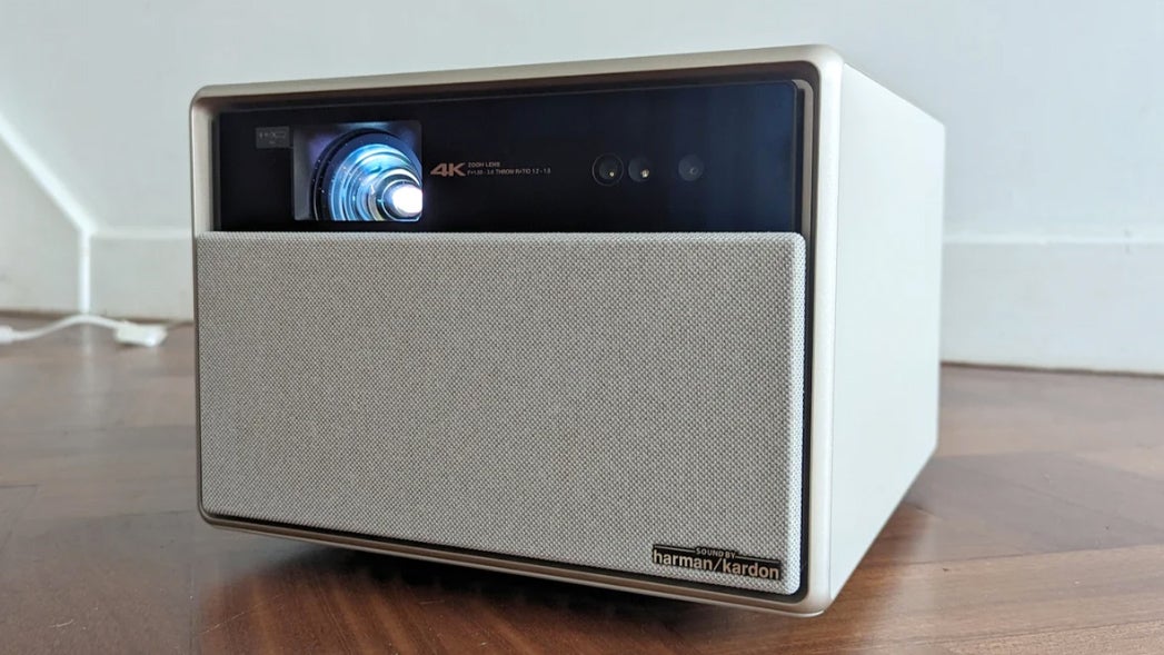 Native 4K laser home cinema projector set up in a blacked-out dedicated cinema room