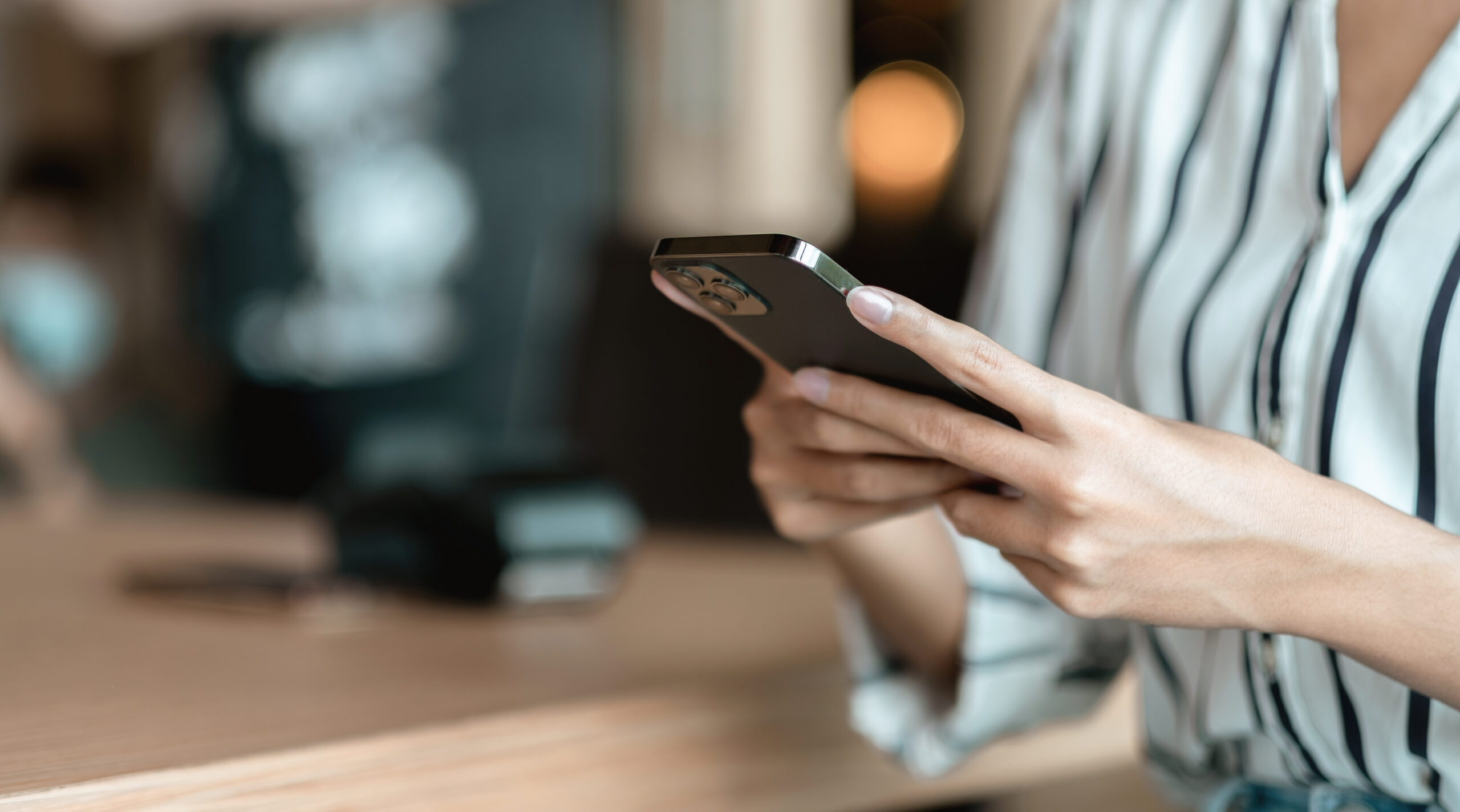 Person using a smartphone, illustrating UK mobile usage habits